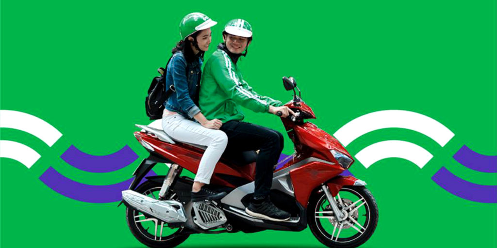 Grab à scooter, présent dans les grandes villes asiatiques